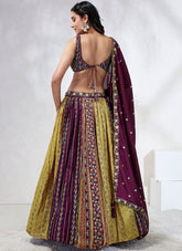 Sequence Patterned Embroidered Silk Wedding Wear Lehenga In Burgundy